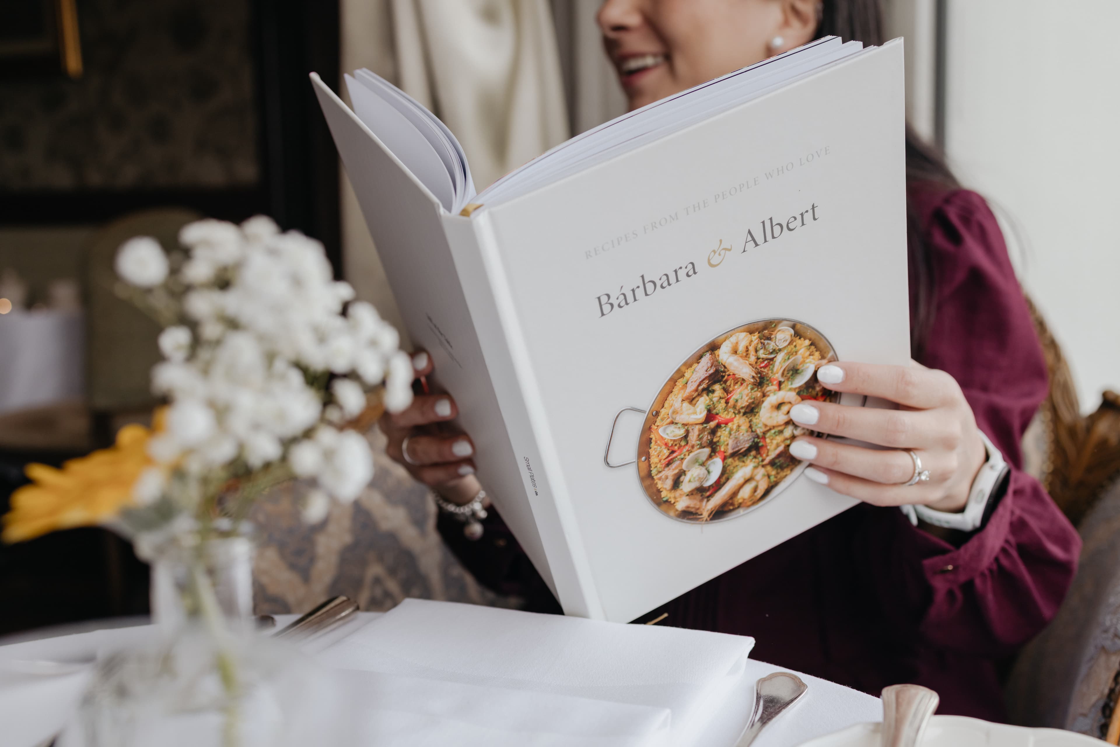 Reading the book at the table